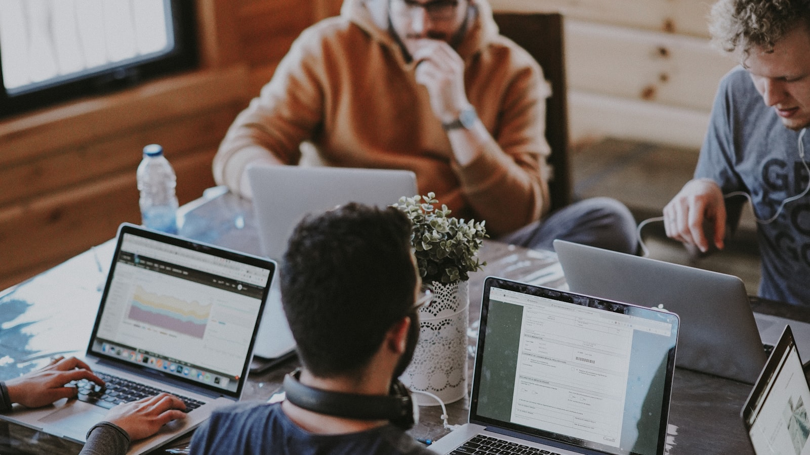 Developers collaborating at a workspace